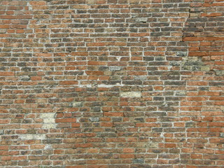 Cracked old brick wall
