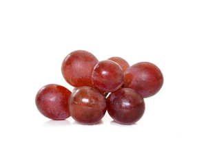 Fresh red grapes isolated on white background.