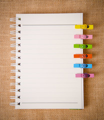 open diary ring binder and wood clip