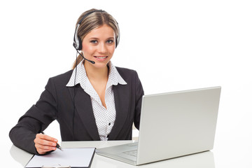 Phone operator with headphones and laptop