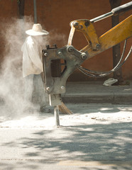 drill concret machine with employees sweeper  dirty dust