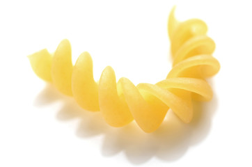 helix shaped Macaroni Pasta raw food background