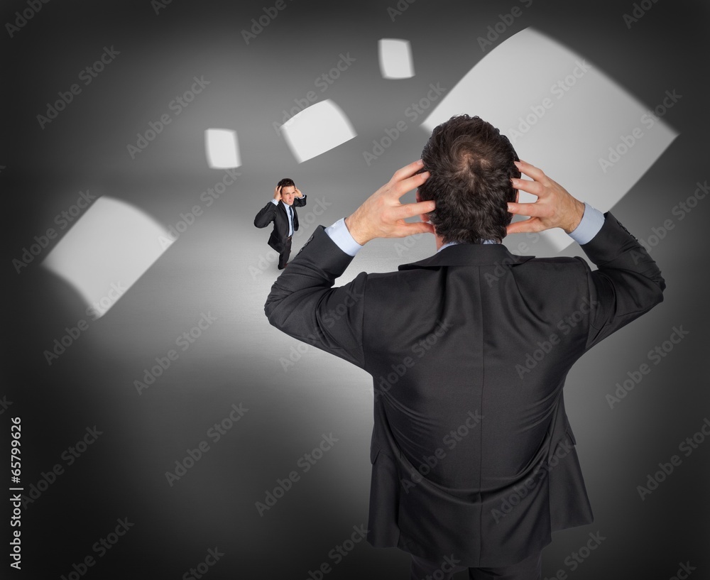 Poster composite image of stressed businessman with tiny businessman