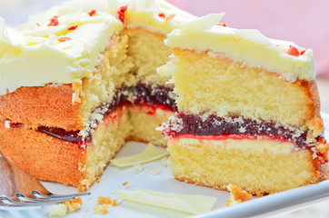 White chocolate jam and cream sponge cake
