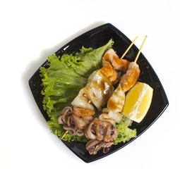 Seafood shashlik isolated on white background