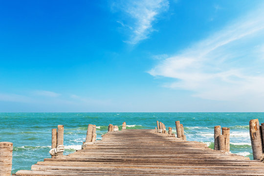 Fototapeta Wooden jetty with blue sky
