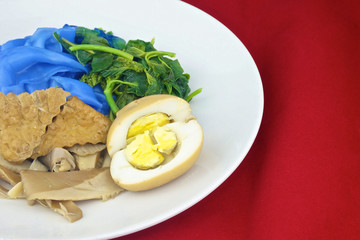 Blue rice noodle gravy vegetarian red background
