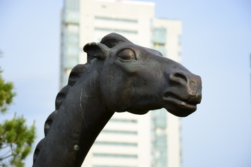 Fototapeta na wymiar A statue featuring a horse's head in Astana / Kayakhstan