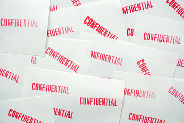 many stamped confidential on white paper