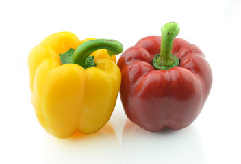 Red and yellow sweet pepper isolated on white background