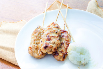 Barbecued pork stick and sticky rice