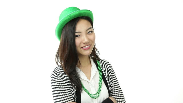 asian girl isolated on white ready for st patrick's day with