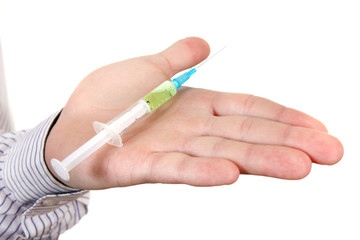 Syringe in a Hand