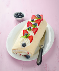 Homemade cake roll with strawberry