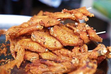 many chicken fried in thai food in sun light