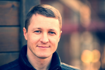 Portrait of a young man in the park