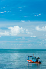 Fototapeta premium Small boat with blue sky