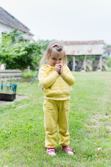 Little girl in backyard
