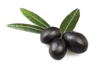 Black olive and leaves on the  white