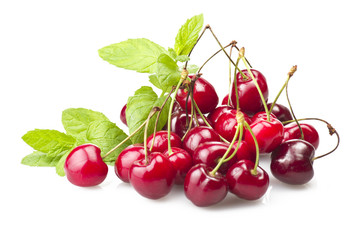Fresh Cherry and leaves of mint on the white