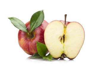 Red apple and leaves on the  white