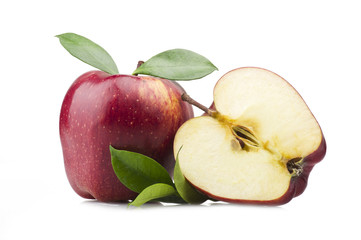 Red apple and leaves on the  white