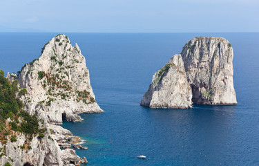 Fototapeta na wymiar Faraglioni, famous giant rocks, Capri island