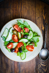 Vegetable salad on wooden background