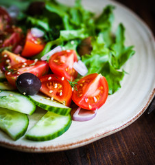 Vegetable salad on wooden background