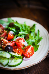 Vegetable salad on wooden background
