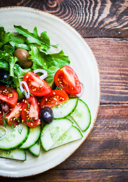 Vegetable salad on wooden background