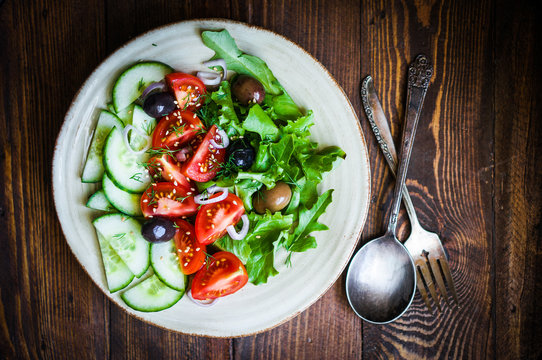 Vegetable salad on wooden background