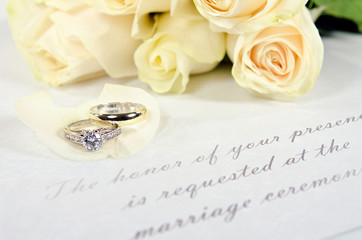 wedding rings on rose petal
