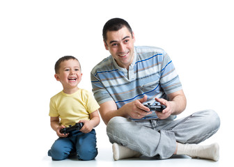 man and his son play with a playstation together