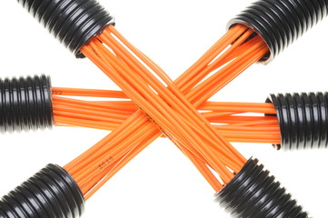 Corrugated pipe with cables isolated on white background 