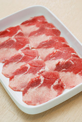 beef tongue sliced on white dish