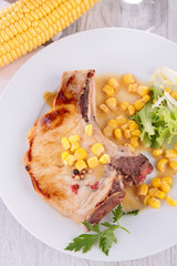 grilled pork chop and corn
