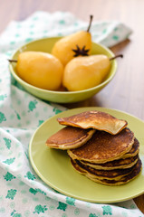 pear stewed in citrus juice and pancakes