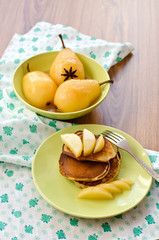 pear stewed in citrus juice and pancakes