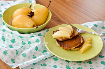 pear stewed in citrus juice and pancakes