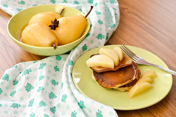 pear stewed in citrus juice and pancakes