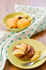 pear stewed in citrus juice and pancakes