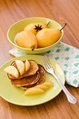 pear stewed in citrus juice and pancakes