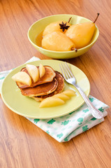 pear stewed in citrus juice and pancakes