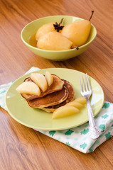pear stewed in citrus juice and pancakes