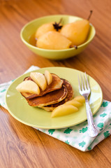 pear stewed in citrus juice and pancakes
