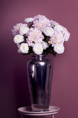 bouquet of roses and hydrangea in a vase