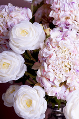 closeup bouquet of roses and hydrangea