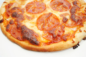 Close-Up of Pepperoni Pizza with Browned Cheese