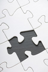 Jigsaw with Blank white pieces and one part missing